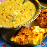 Bowl of turkey chowder and garlic bread