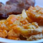 Plate full of ham and potatoes au gratin