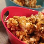 Pink bowl of caramel corn