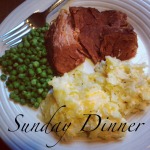 White plate with a pile of pea, slice of ham, and mound of Hashbrown Casserole