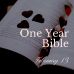 Open Bible with red glitter hearts scattered across the pages