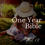Woman in a hat reading a Bible