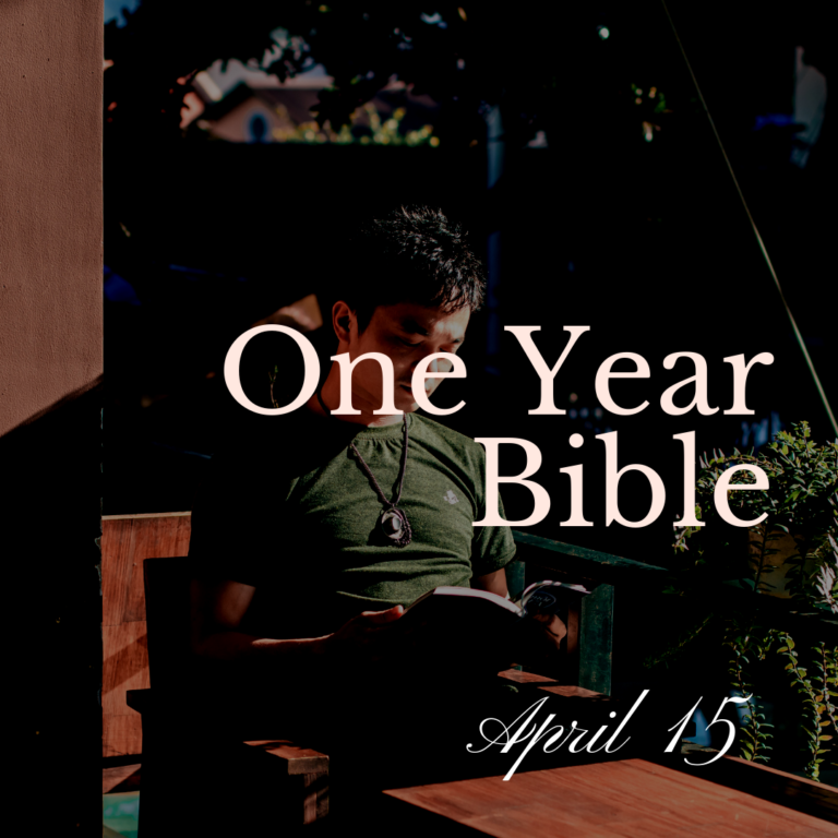 Man on bench reading a Bible